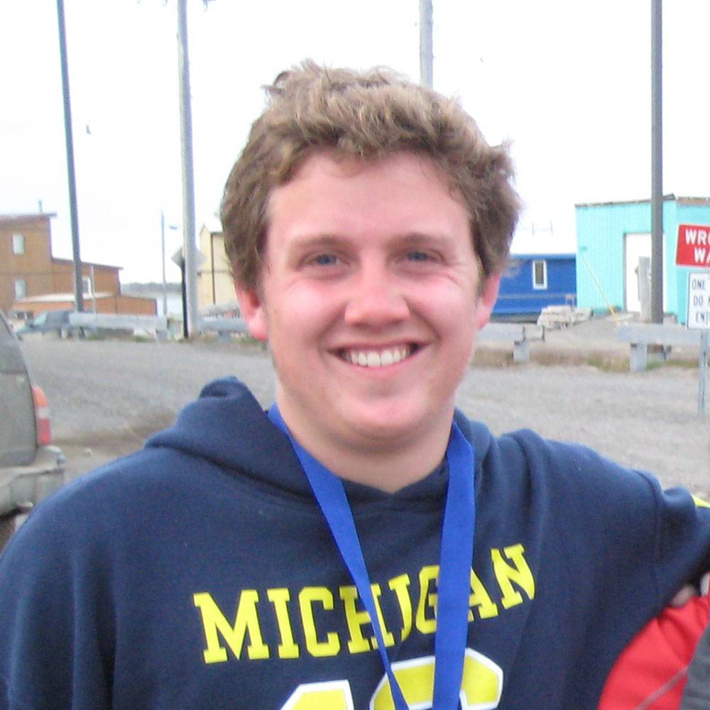 Chase smiles at camera.